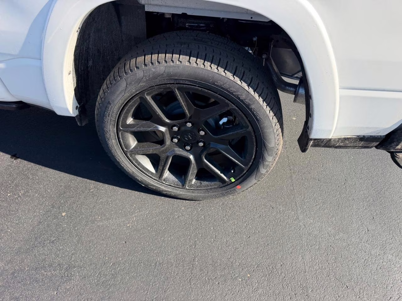 2026 Ivory White Tri-Coat Pearlcoat Ram 1500 Laramie 4X4 Truck