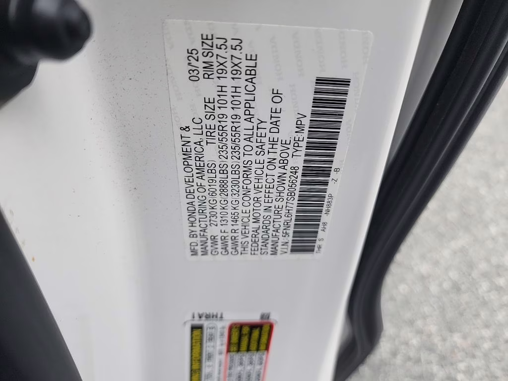 2025 white Honda Odyssey Sport-L FWD Van