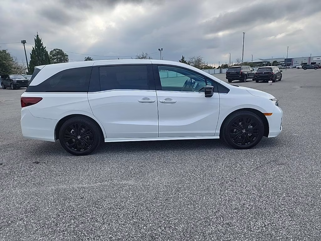 2025 white Honda Odyssey Sport-L FWD Van