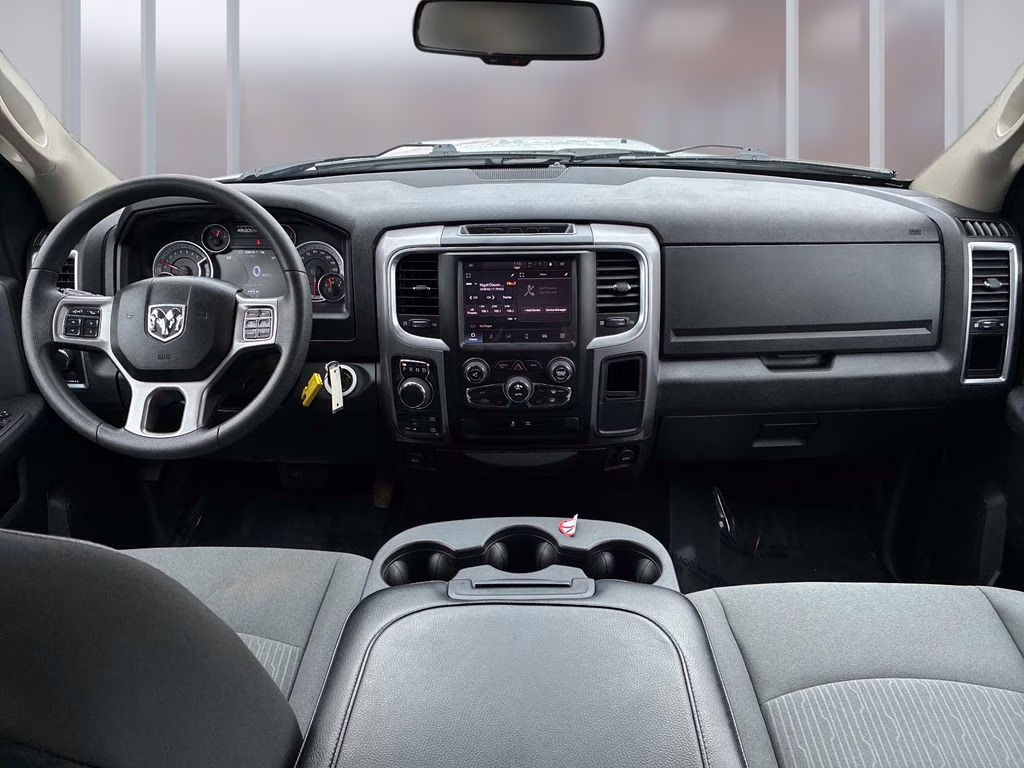 2023 Bright White Clearcoat Ram 1500 Classic SLT 4X4 Truck