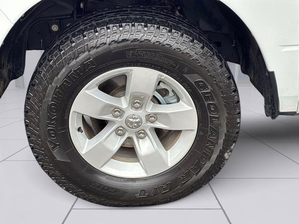 2023 Bright White Clearcoat Ram 1500 Classic SLT 4X4 Truck