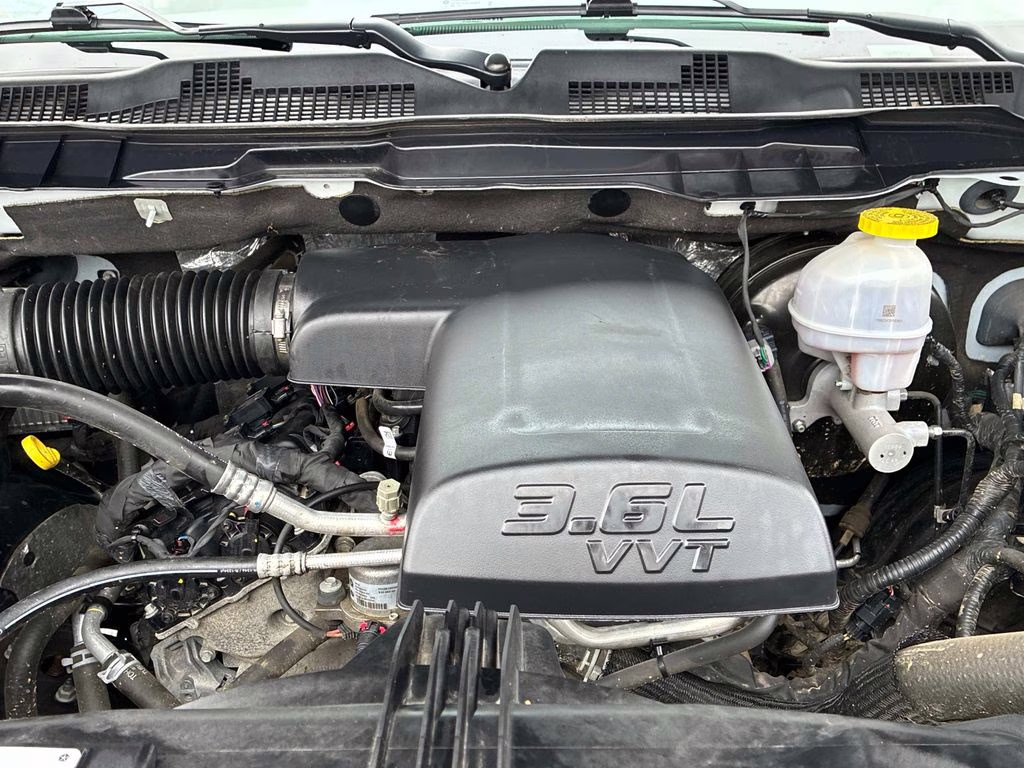 2023 Bright White Clearcoat Ram 1500 Classic SLT 4X4 Truck