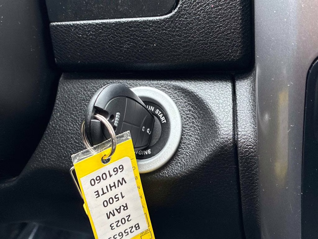 2023 Bright White Clearcoat Ram 1500 Classic SLT 4X4 Truck