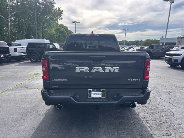 2026 Forged Blue Metallic Ram 1500 Laramie 4X4 Truck