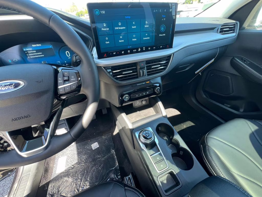 2025 Agate Black Metallic Ford Escape PHEV FWD SUV
