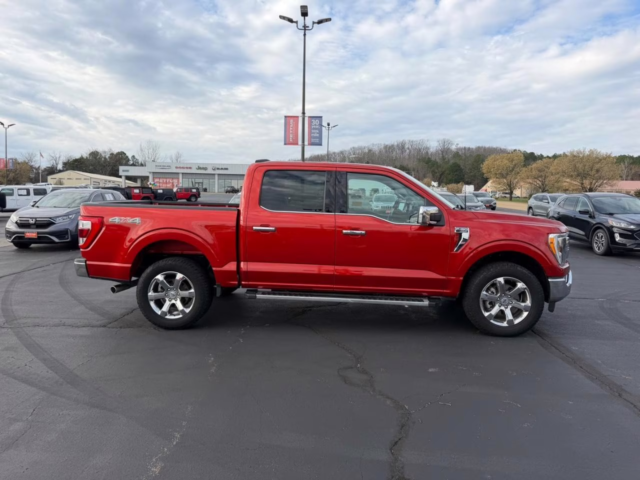 2023 Hot Pepper Red Metallic Tinted Clearcoat Ford F-150 Lariat 4X4 Truck