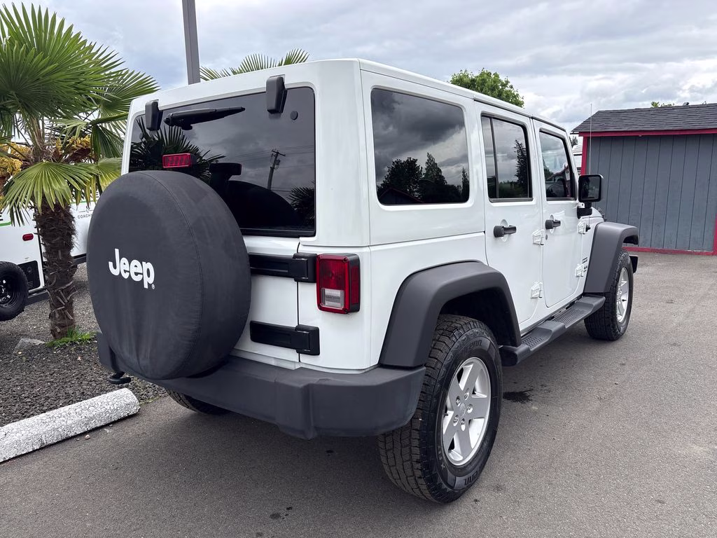 2012 Bright White Clearcoat Jeep Wrangler Unlimited Sport 4X4 SUV