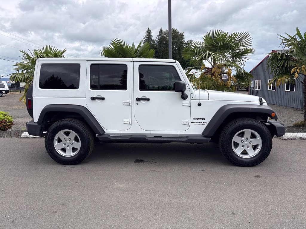 2012 Bright White Clearcoat Jeep Wrangler Unlimited Sport 4X4 SUV