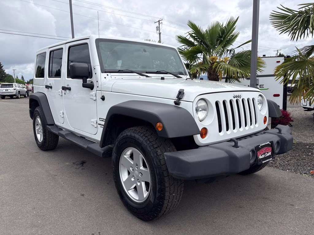2012 Bright White Clearcoat Jeep Wrangler Unlimited Sport 4X4 SUV