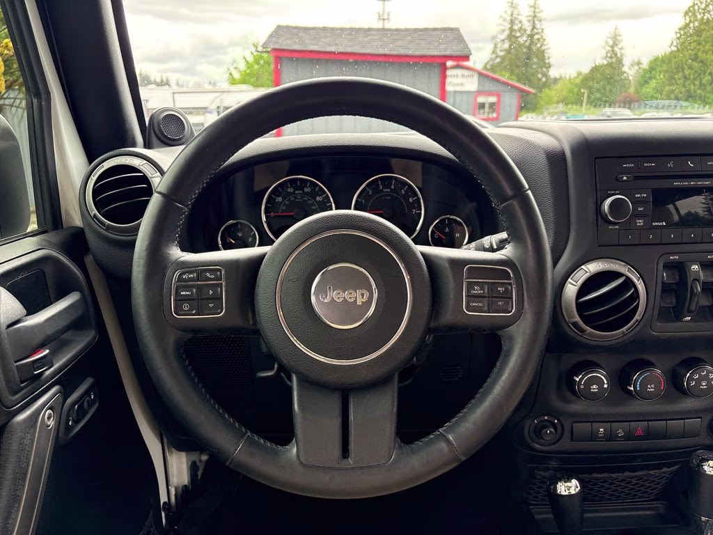 2012 Bright White Clearcoat Jeep Wrangler Unlimited Sport 4X4 SUV