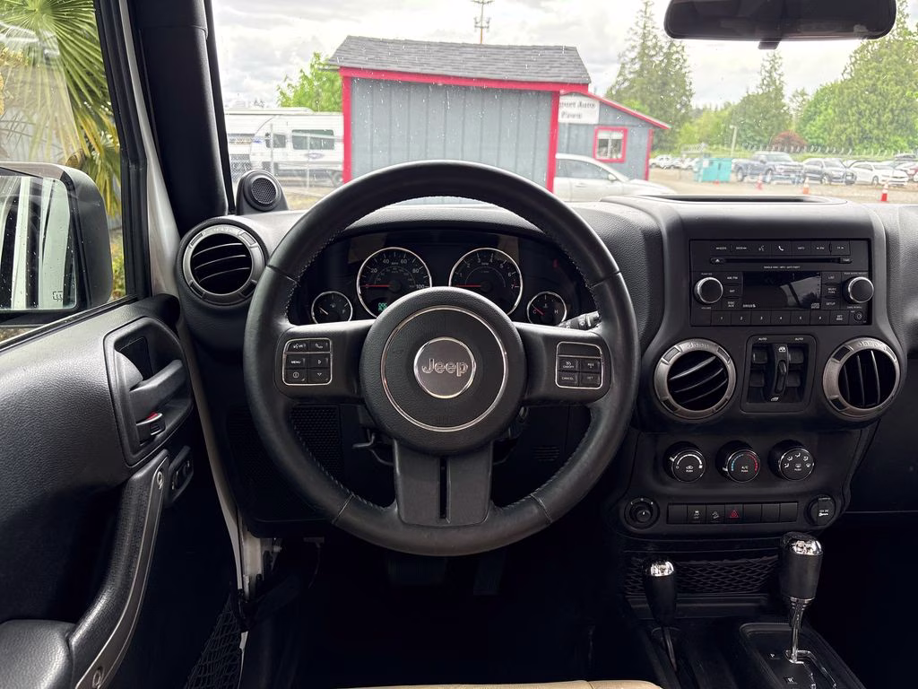 2012 Bright White Clearcoat Jeep Wrangler Unlimited Sport 4X4 SUV