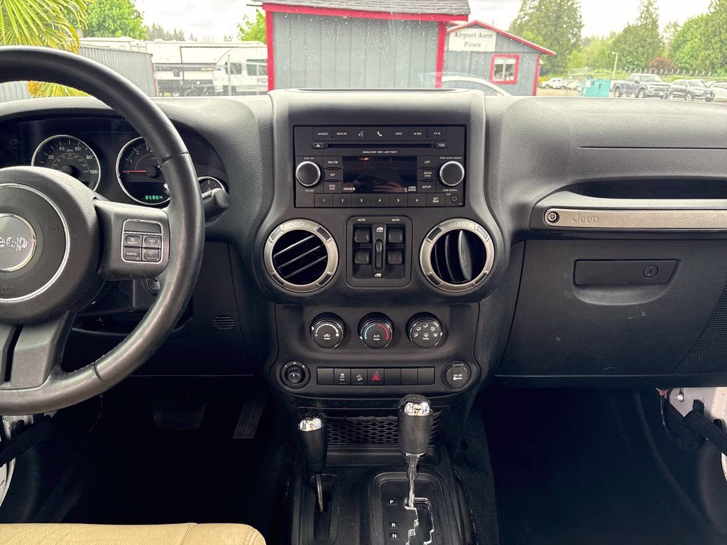2012 Bright White Clearcoat Jeep Wrangler Unlimited Sport 4X4 SUV