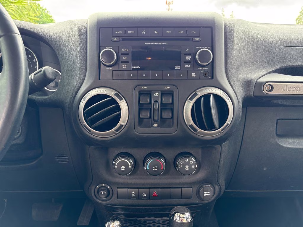 2012 Bright White Clearcoat Jeep Wrangler Unlimited Sport 4X4 SUV