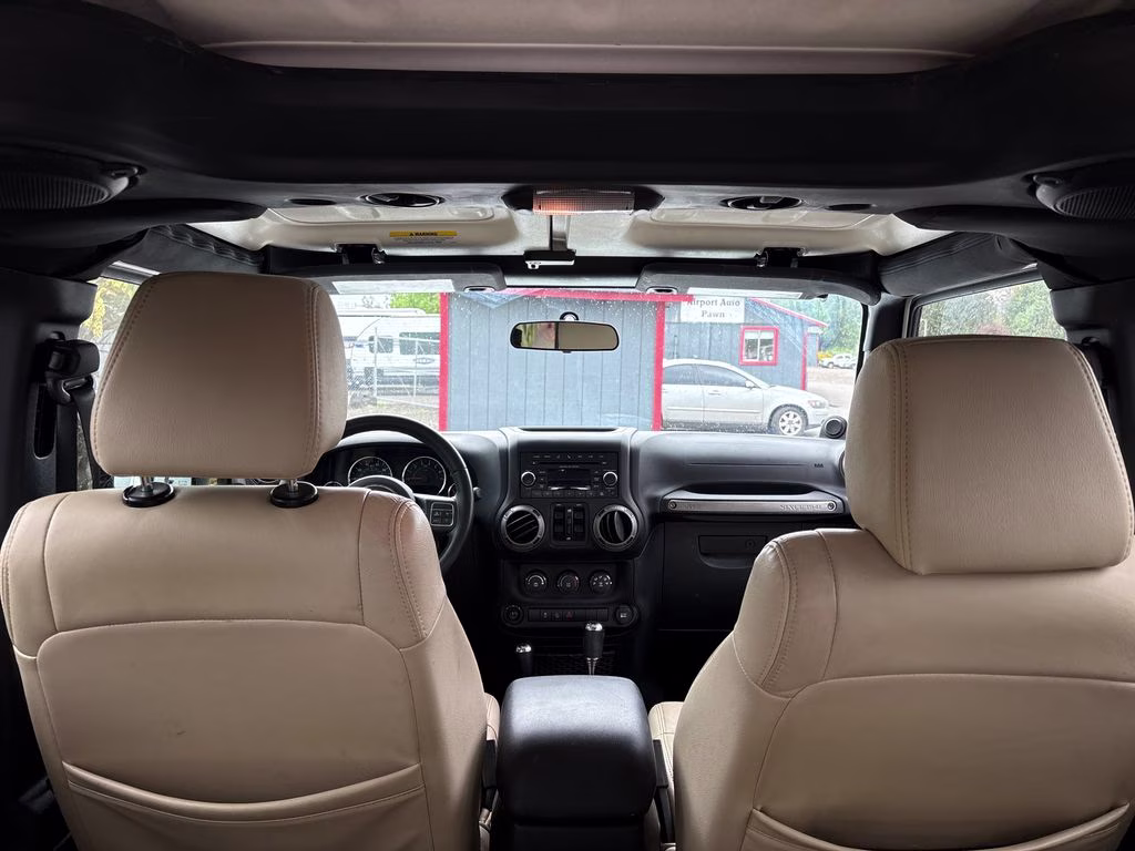 2012 Bright White Clearcoat Jeep Wrangler Unlimited Sport 4X4 SUV