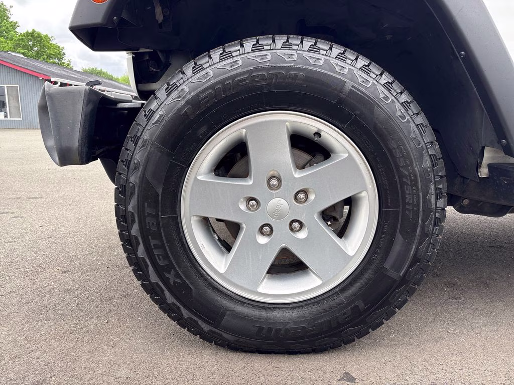 2012 Bright White Clearcoat Jeep Wrangler Unlimited Sport 4X4 SUV