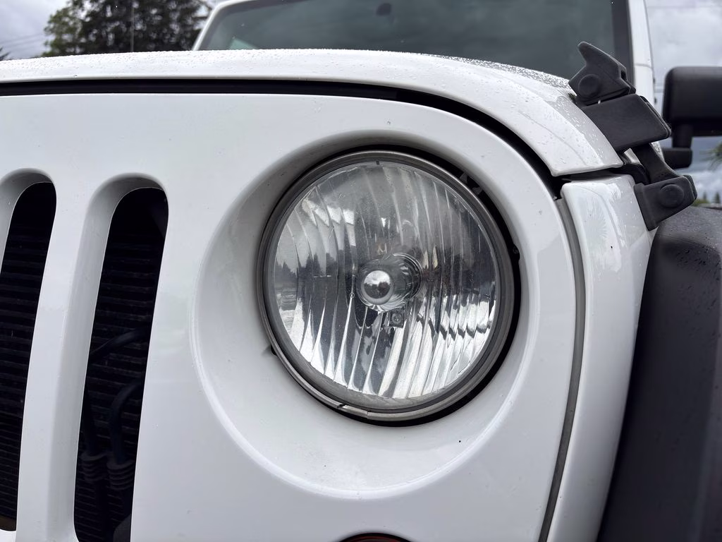 2012 Bright White Clearcoat Jeep Wrangler Unlimited Sport 4X4 SUV
