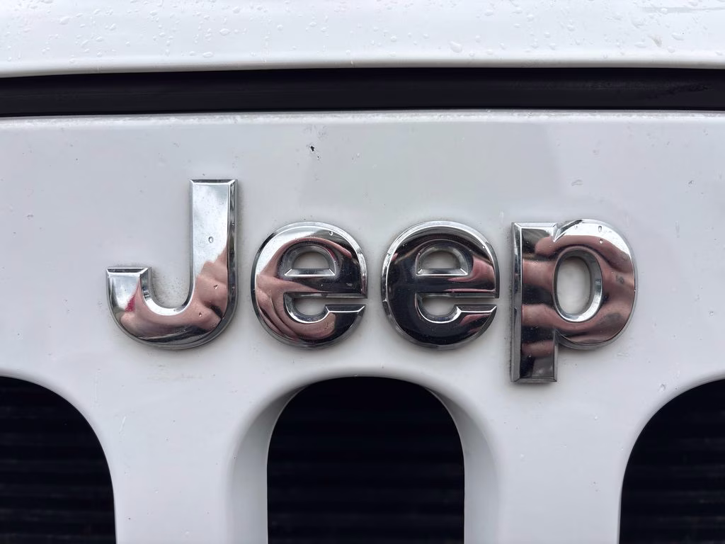 2012 Bright White Clearcoat Jeep Wrangler Unlimited Sport 4X4 SUV