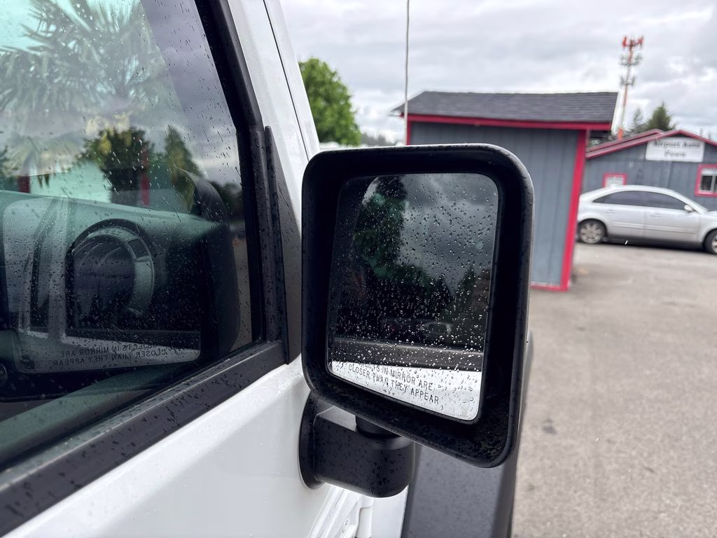 2012 Bright White Clearcoat Jeep Wrangler Unlimited Sport 4X4 SUV