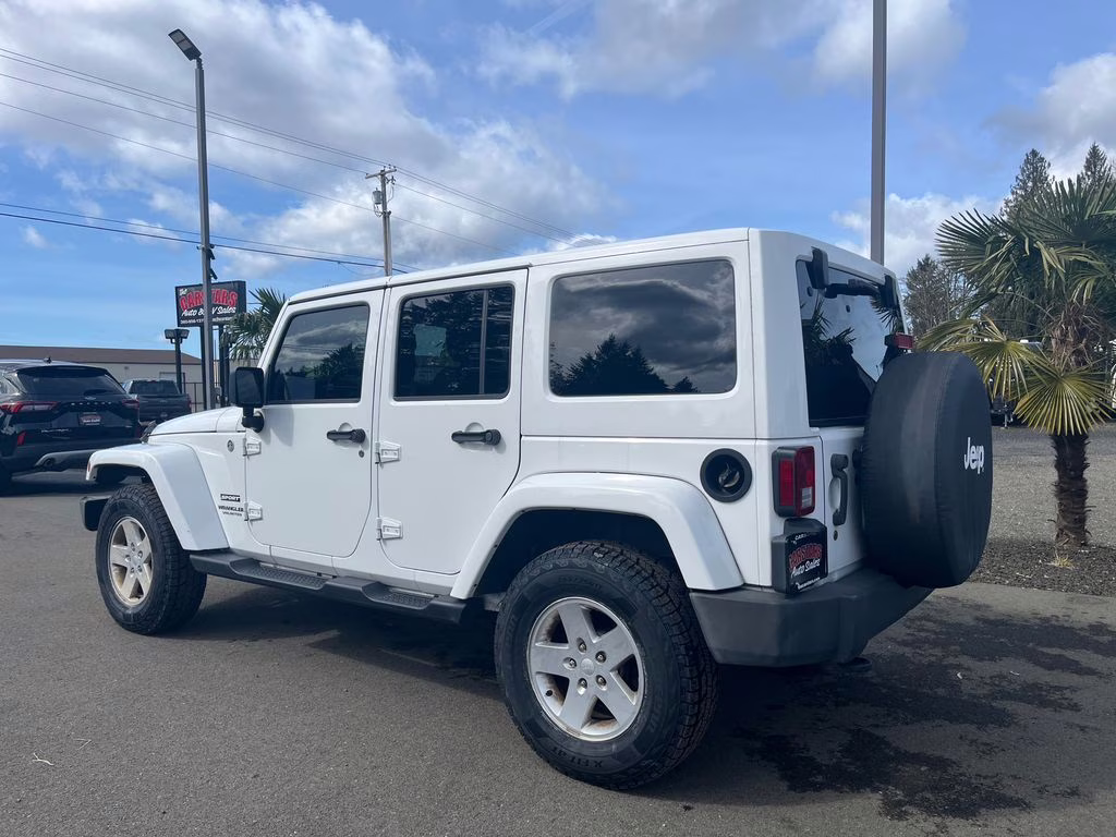2012 Bright White Clearcoat Jeep Wrangler Unlimited Sport 4X4 SUV