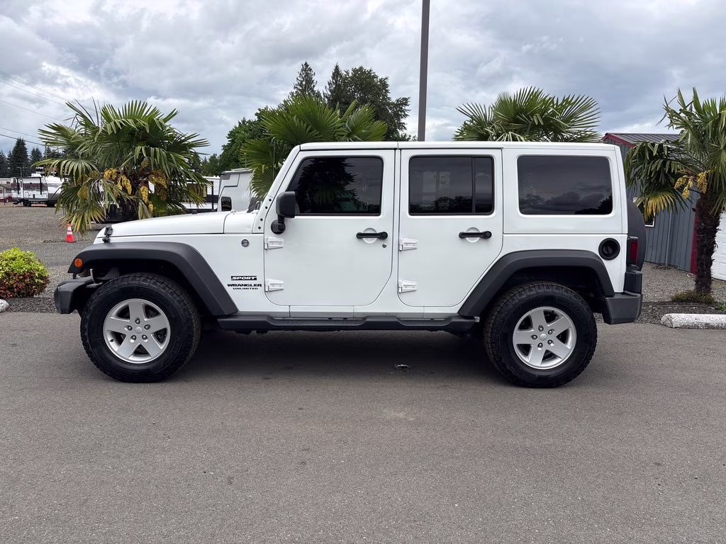 2012 Bright White Clearcoat Jeep Wrangler Unlimited Sport 4X4 SUV