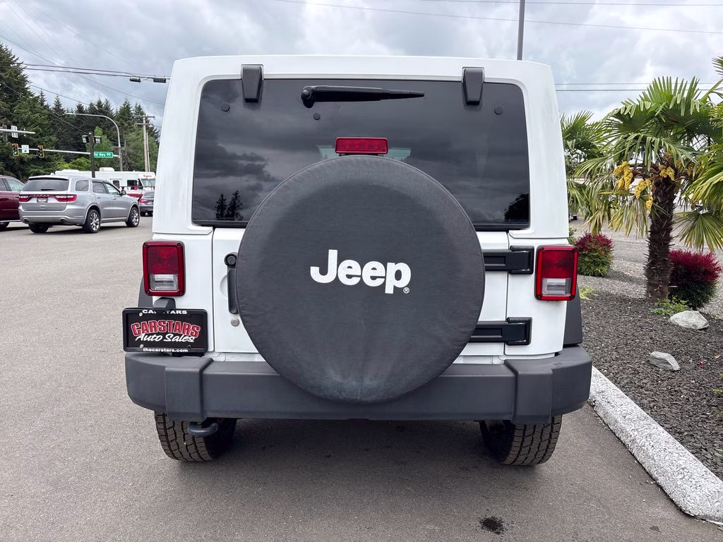 2012 Bright White Clearcoat Jeep Wrangler Unlimited Sport 4X4 SUV