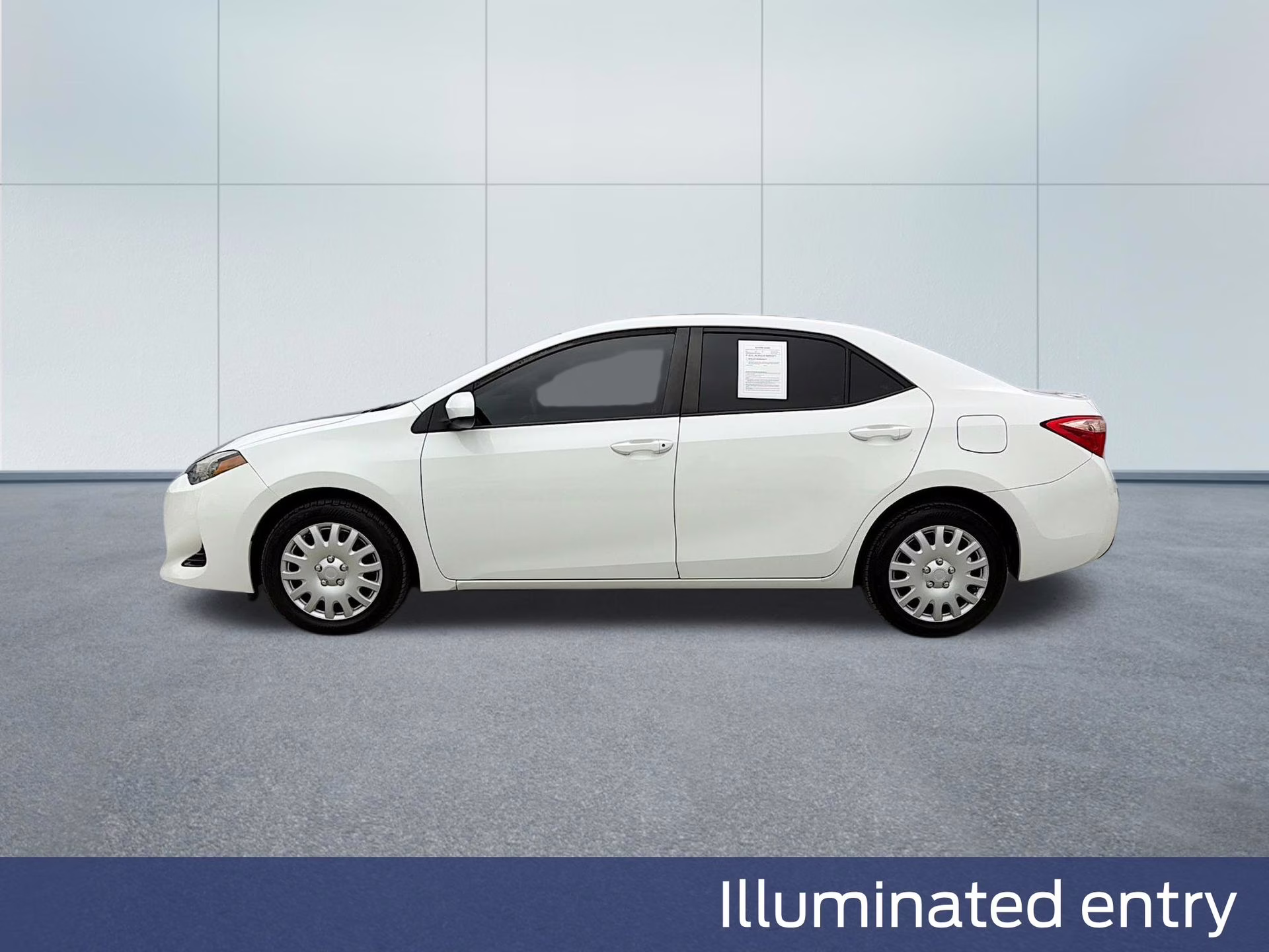 2019 Super White Toyota Corolla LE FWD Sedan