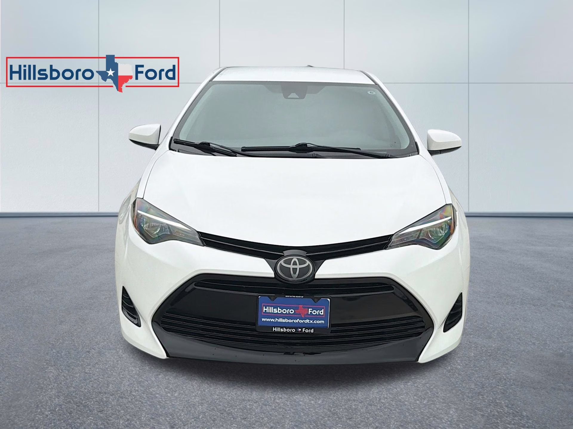 2019 Super White Toyota Corolla LE FWD Sedan