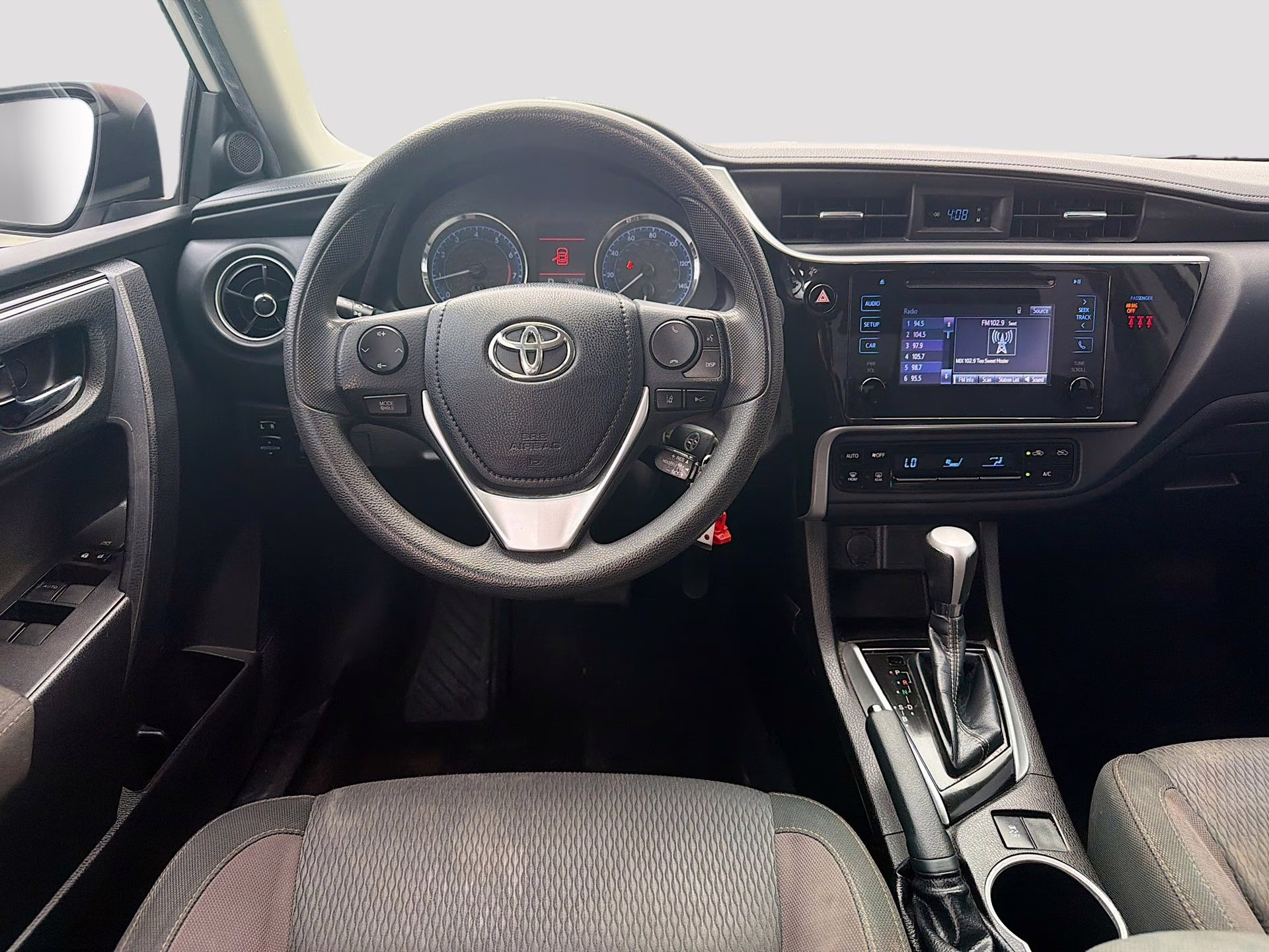 2019 Super White Toyota Corolla LE FWD Sedan