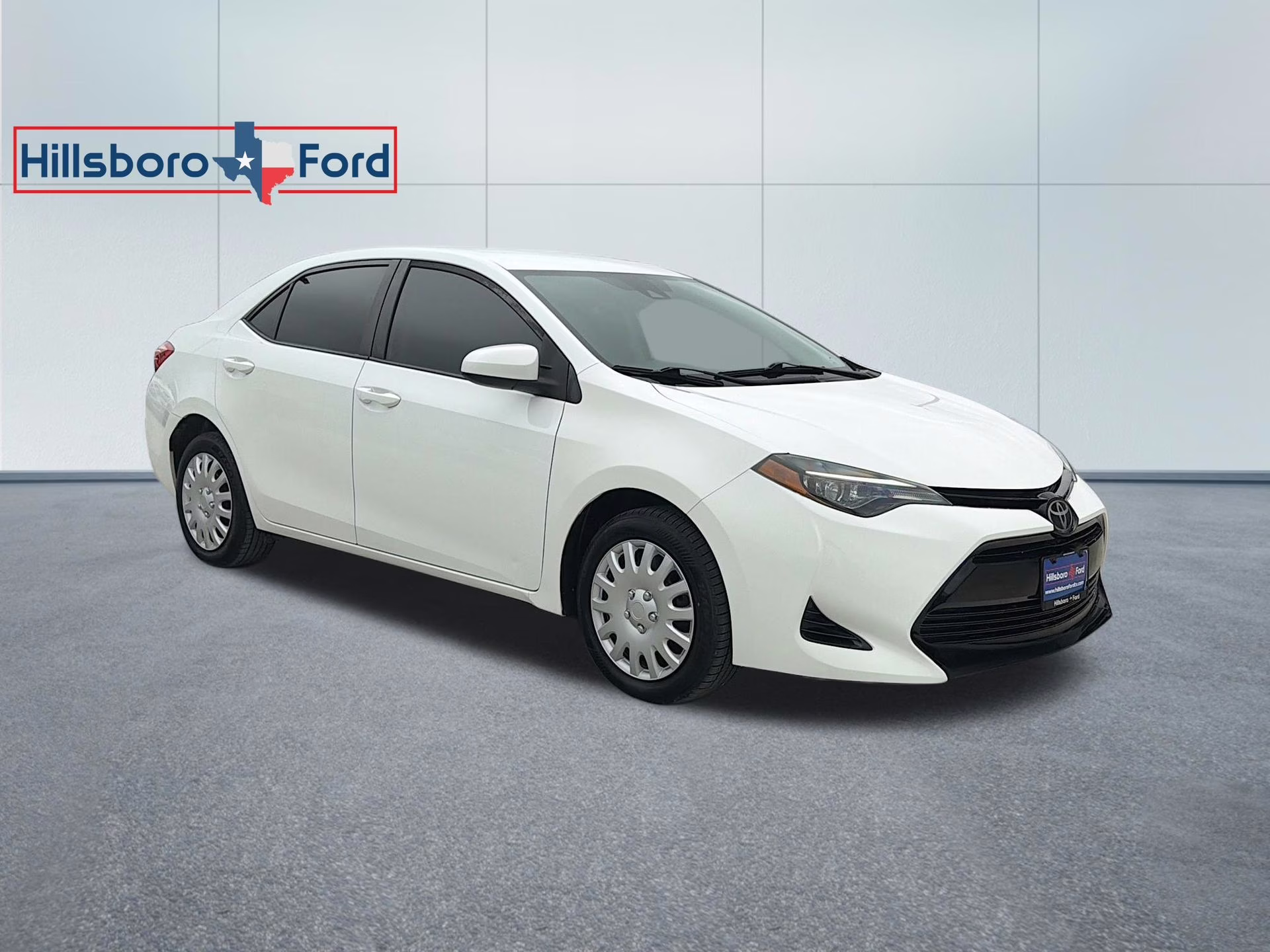 2019 Super White Toyota Corolla LE FWD Sedan