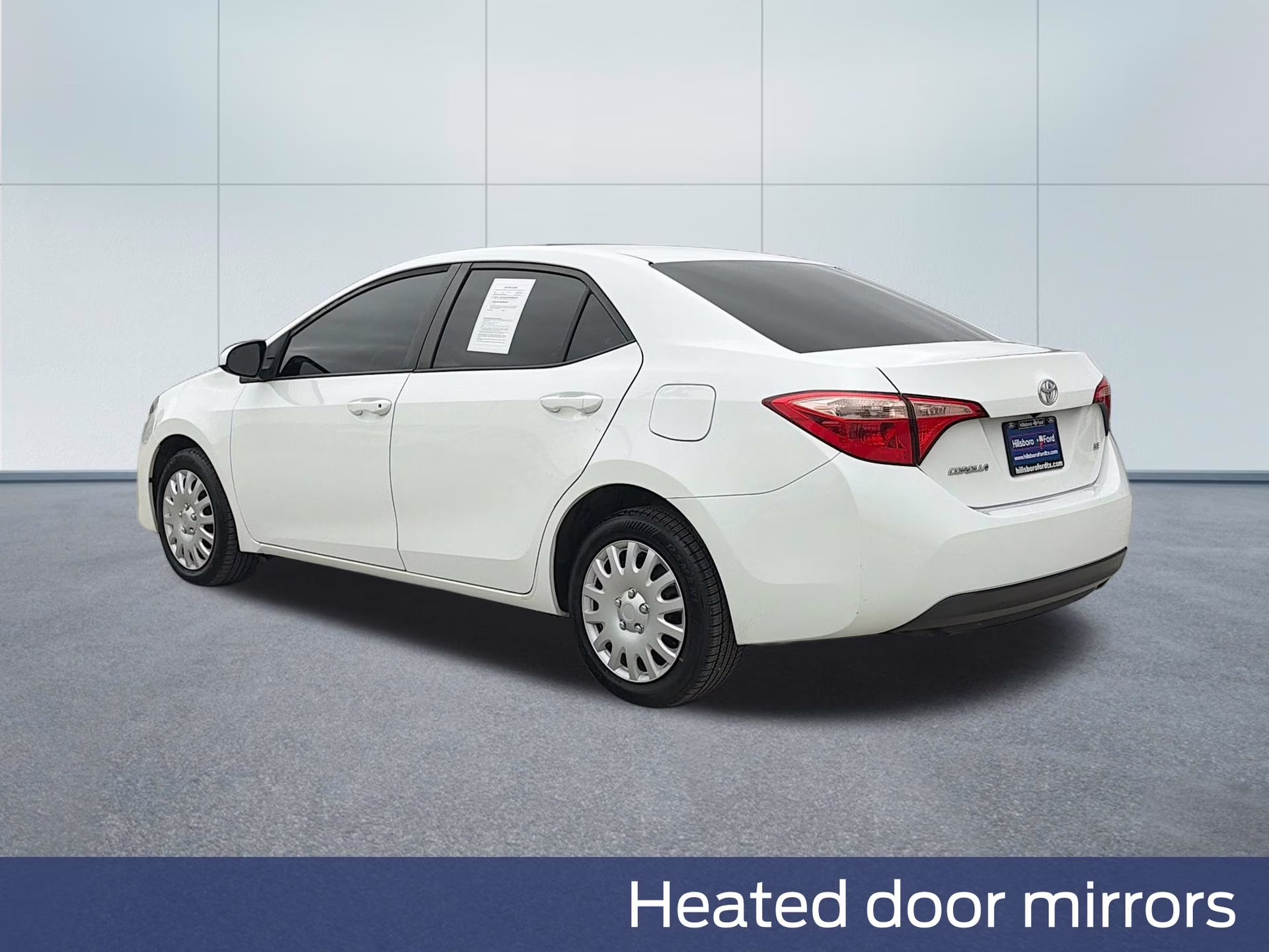 2019 Super White Toyota Corolla LE FWD Sedan