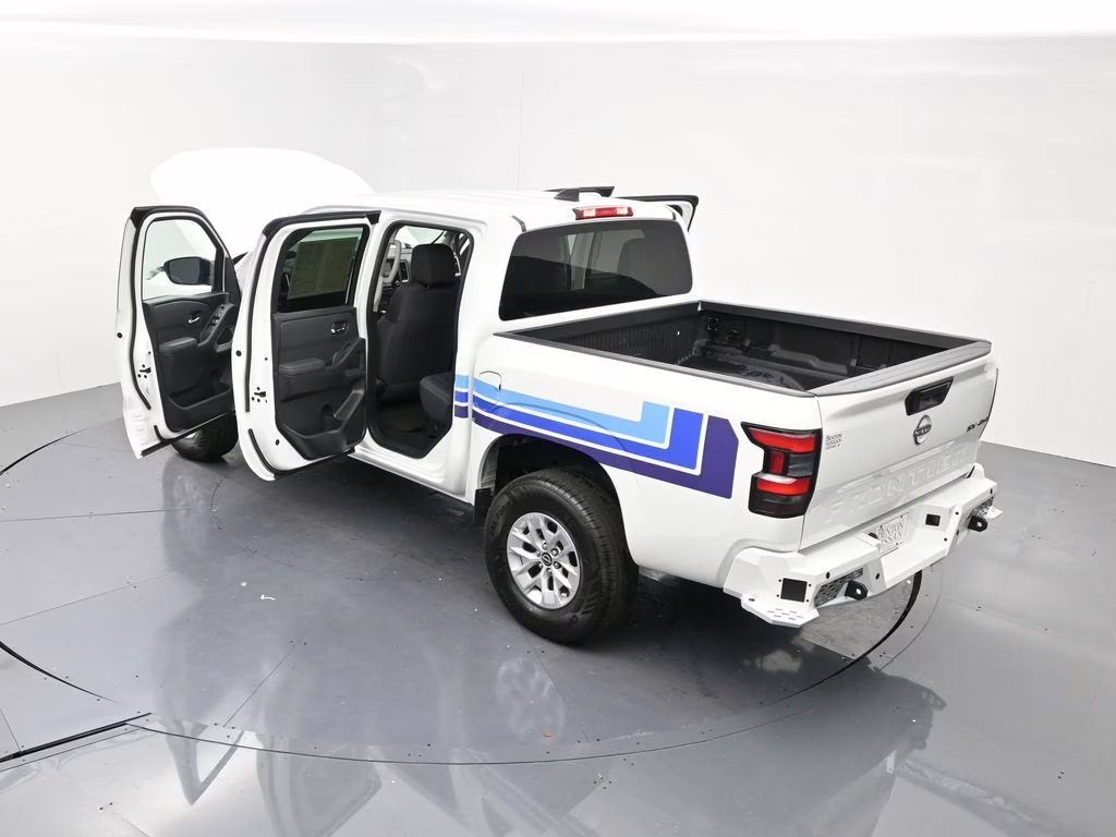 2024 Glacier White Nissan Frontier SV 4X4 Truck