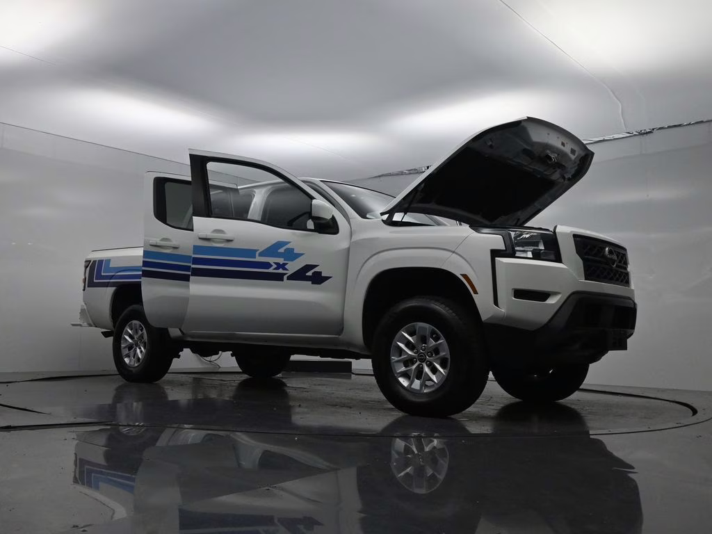 2024 Glacier White Nissan Frontier SV 4X4 Truck