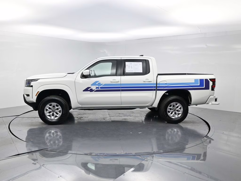 2024 Glacier White Nissan Frontier SV 4X4 Truck