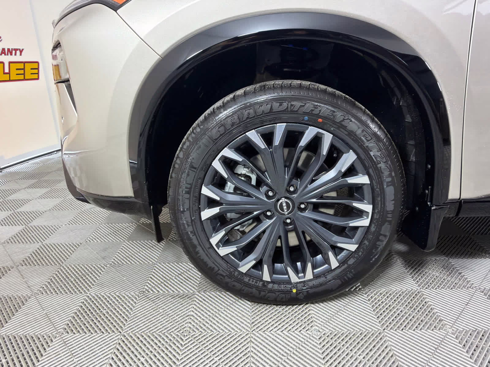 2026 Champagne Silver Metallic/Super Black Nissan Rogue Platinum AWD SUV