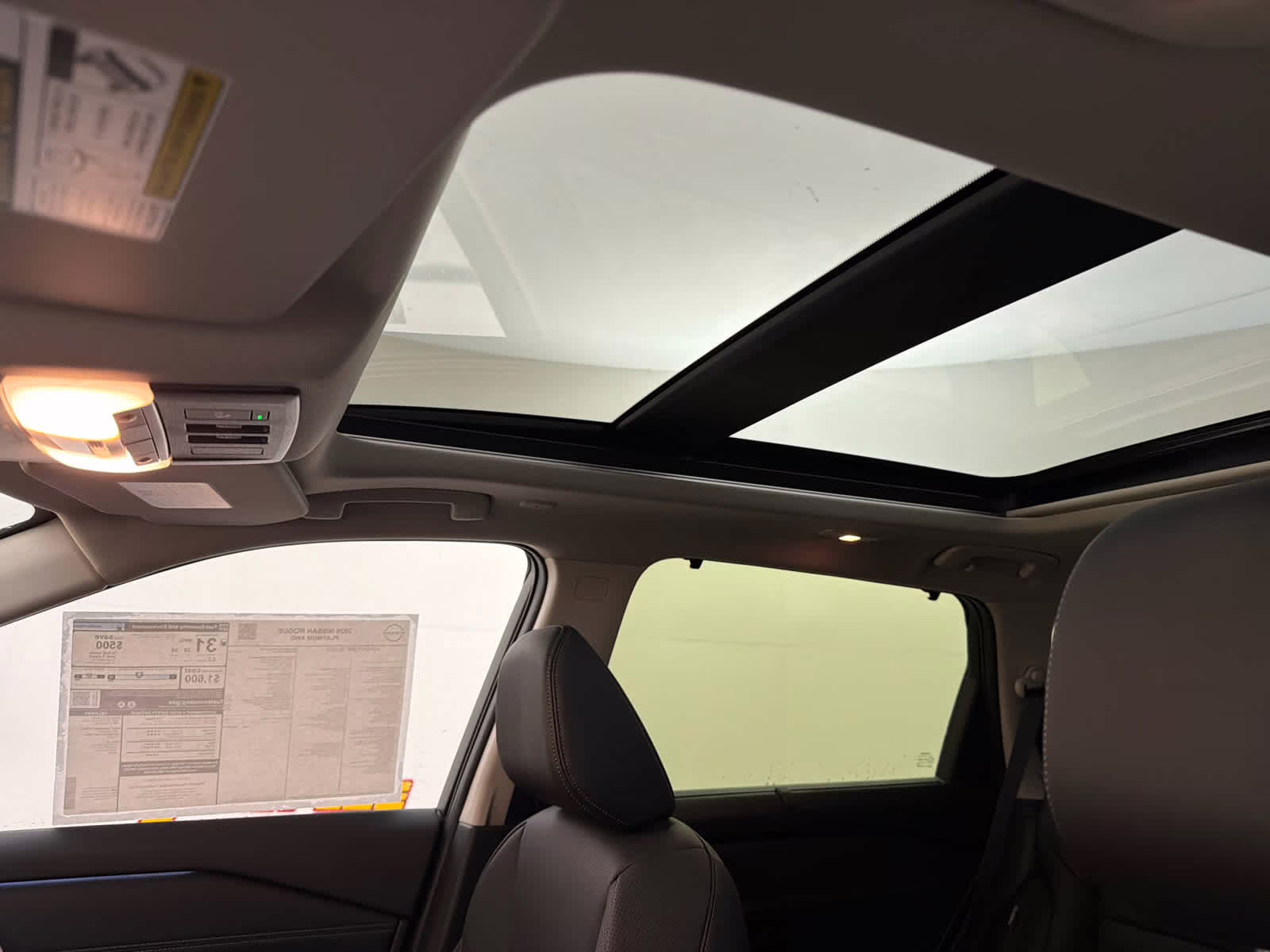 2026 Champagne Silver Metallic/Super Black Nissan Rogue Platinum AWD SUV