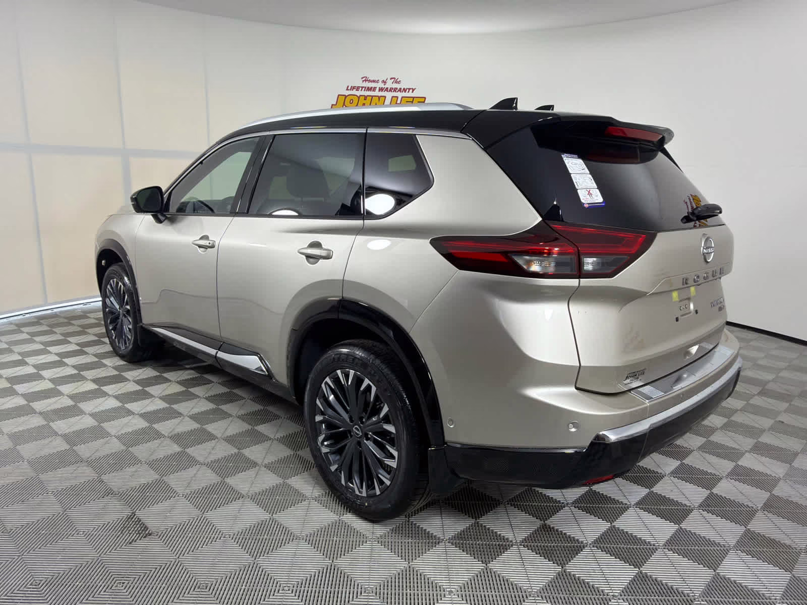 2026 Champagne Silver Metallic/Super Black Nissan Rogue Platinum AWD SUV