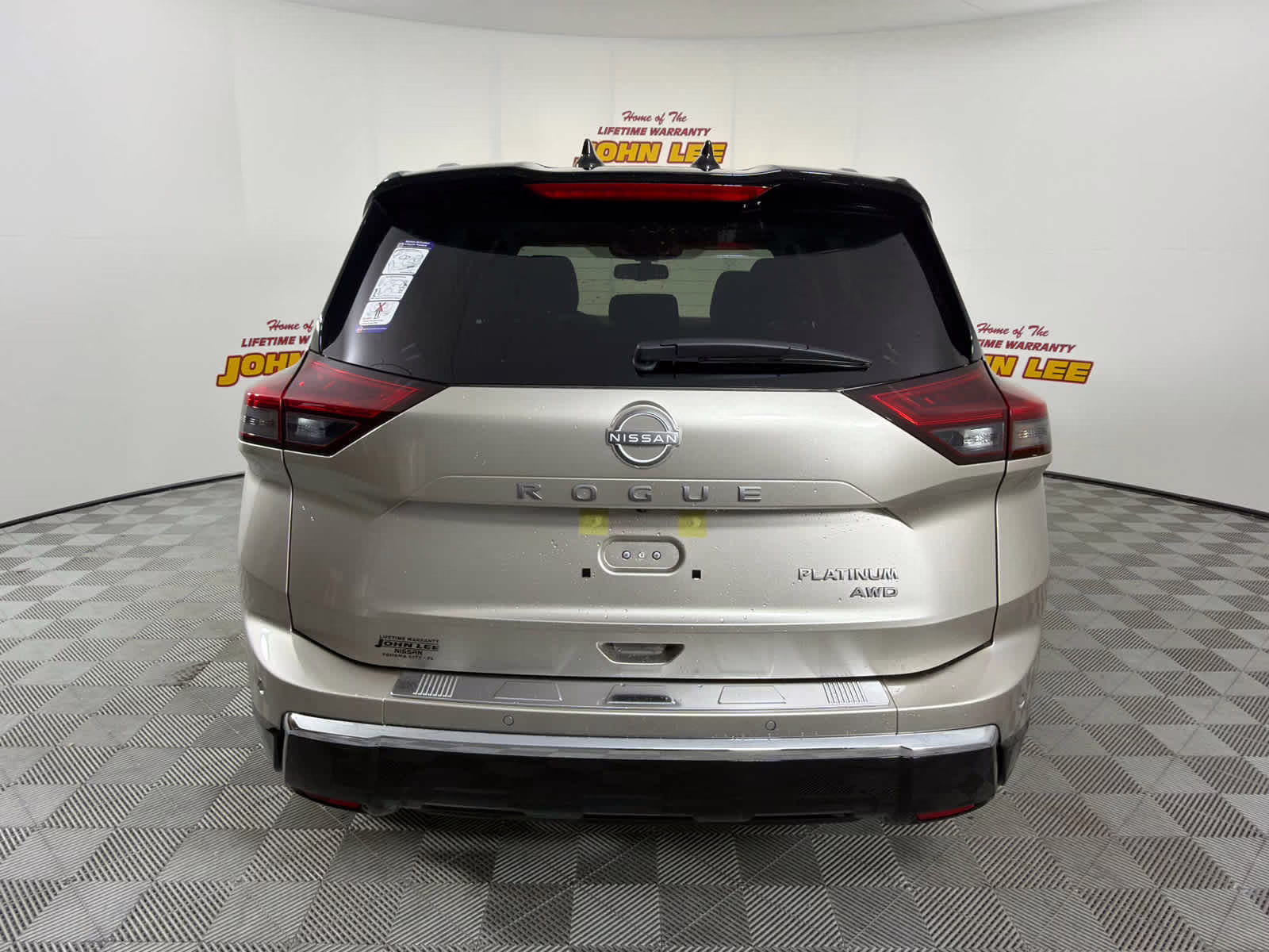 2026 Champagne Silver Metallic/Super Black Nissan Rogue Platinum AWD SUV