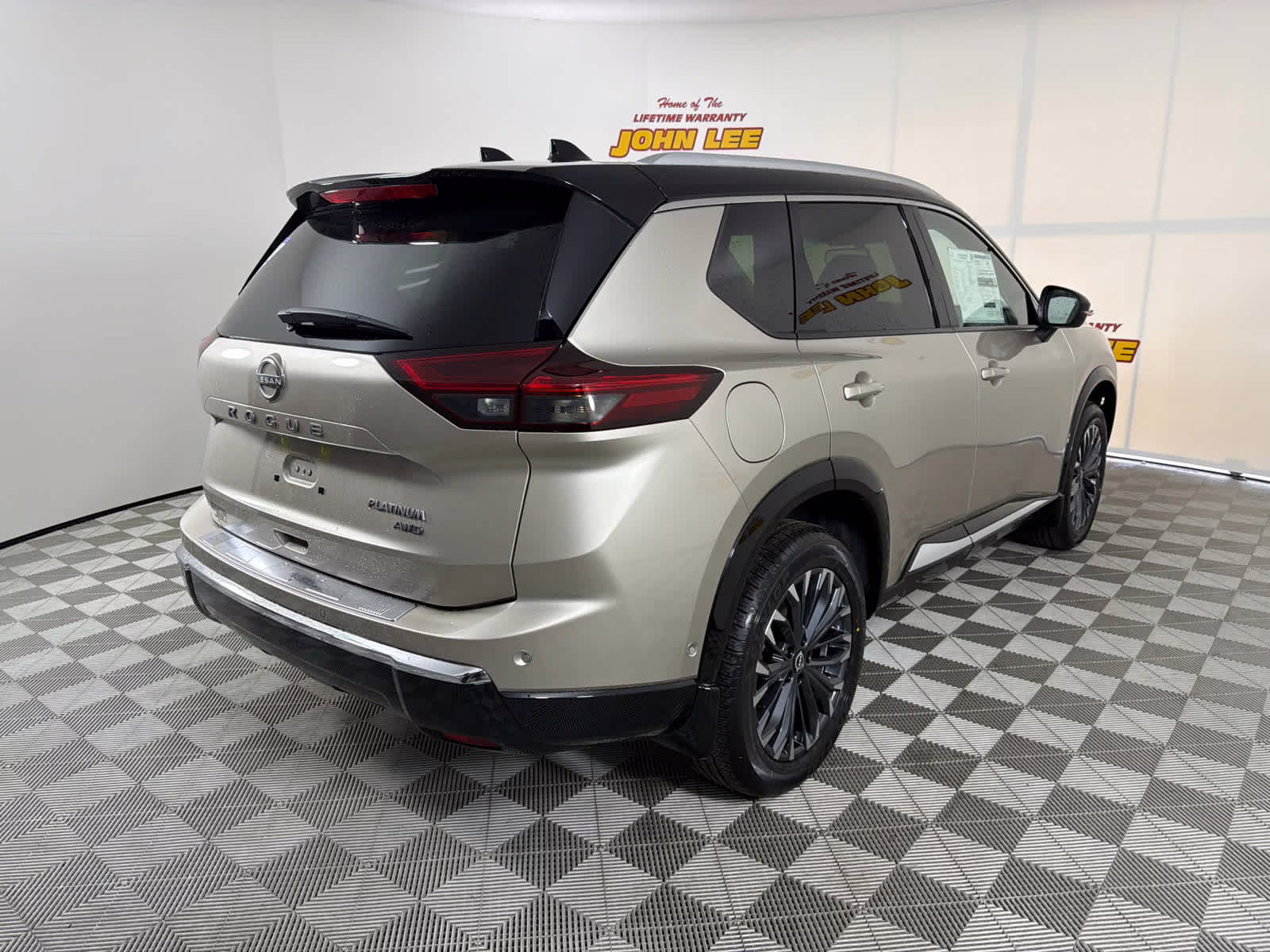 2026 Champagne Silver Metallic/Super Black Nissan Rogue Platinum AWD SUV