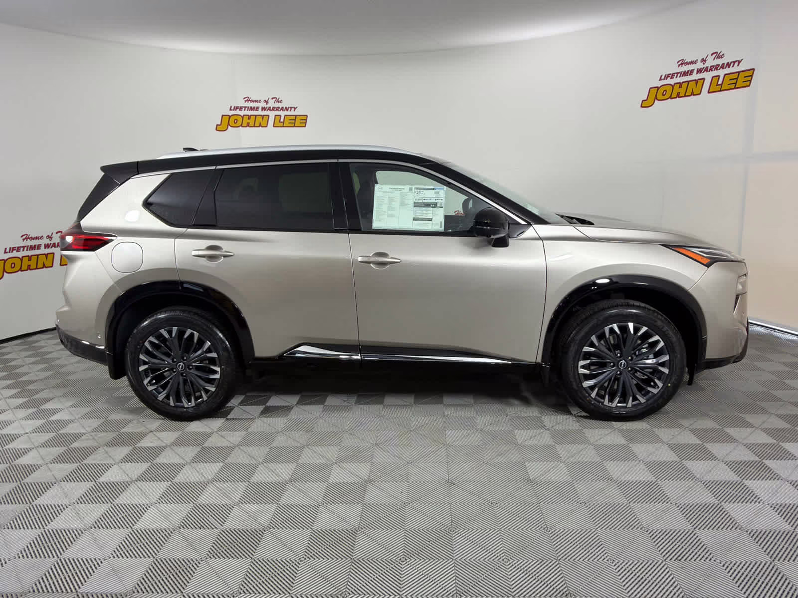 2026 Champagne Silver Metallic/Super Black Nissan Rogue Platinum AWD SUV