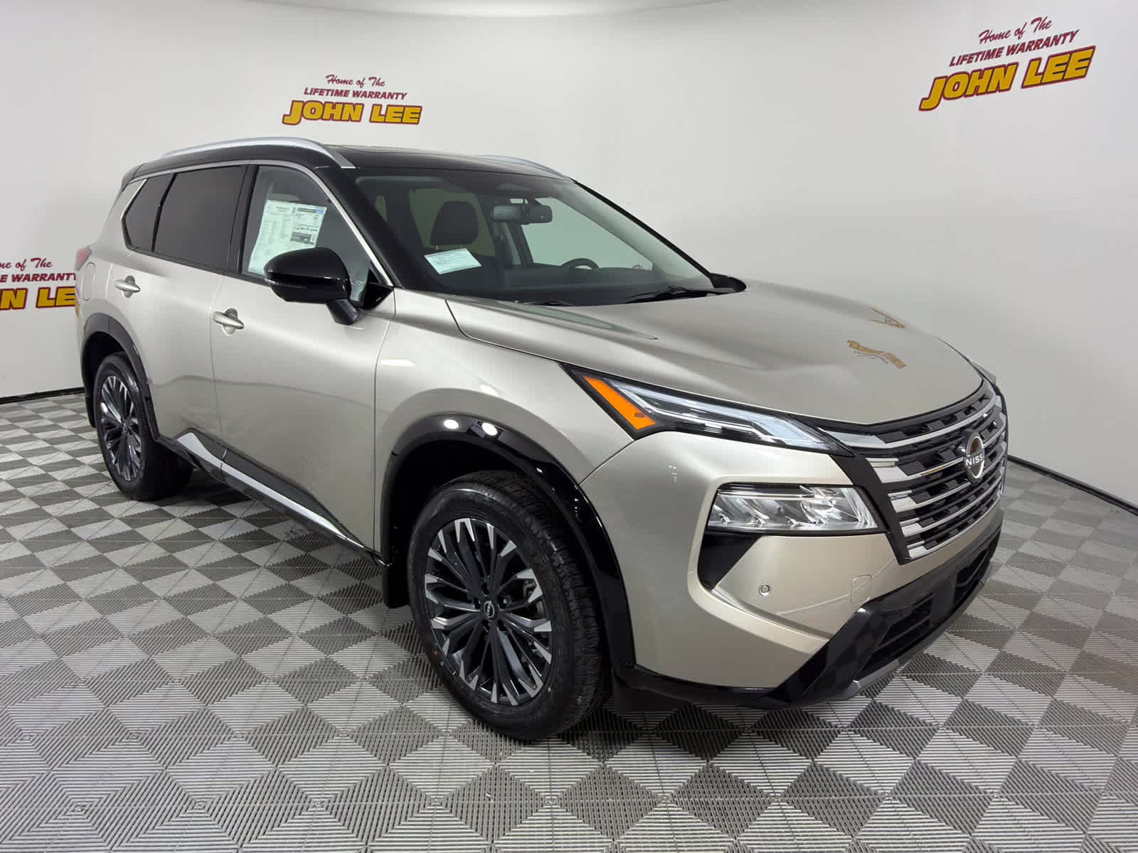 2026 Champagne Silver Metallic/Super Black Nissan Rogue Platinum AWD SUV