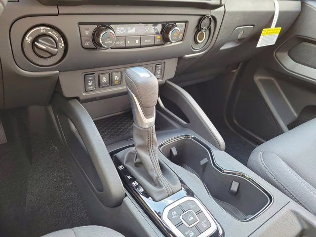 2026 Glacier White Nissan Frontier SV 4X4 Truck