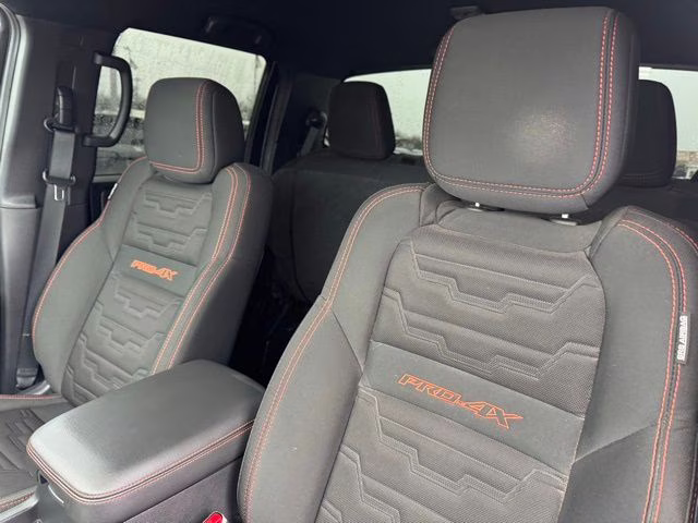 2023 Glacier White Nissan Frontier PRO-4X 4X4 Truck