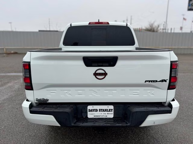 2023 Glacier White Nissan Frontier PRO-4X 4X4 Truck