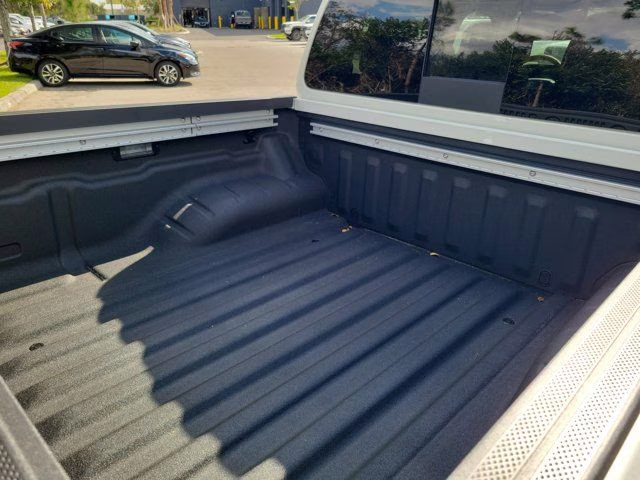 2026 Glacier White Nissan Frontier SV 4X4 Truck