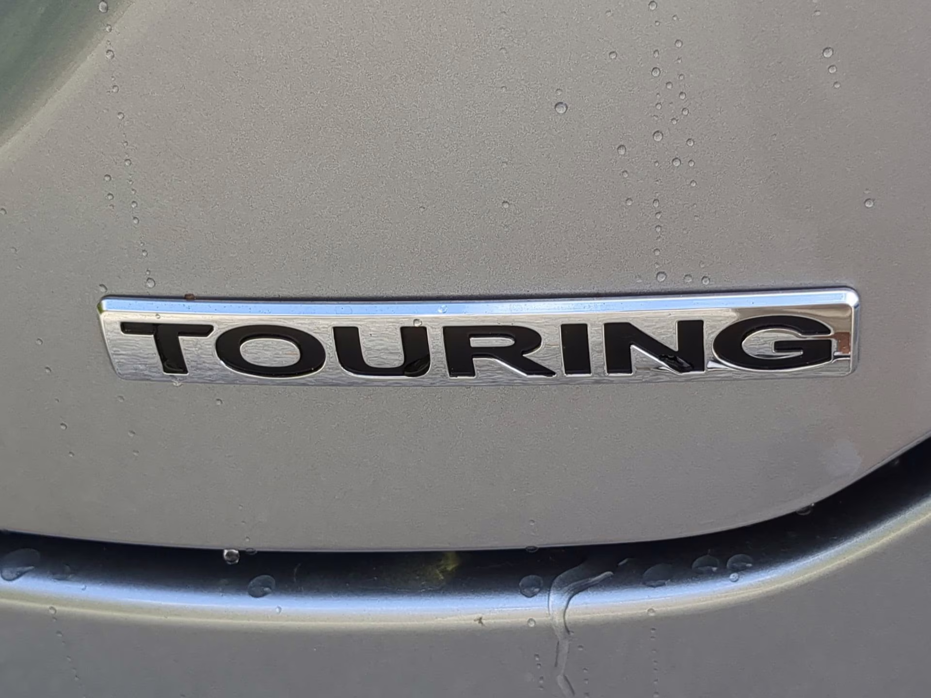 2024 Lunar Silver Metallic Honda Pilot Touring FWD SUV