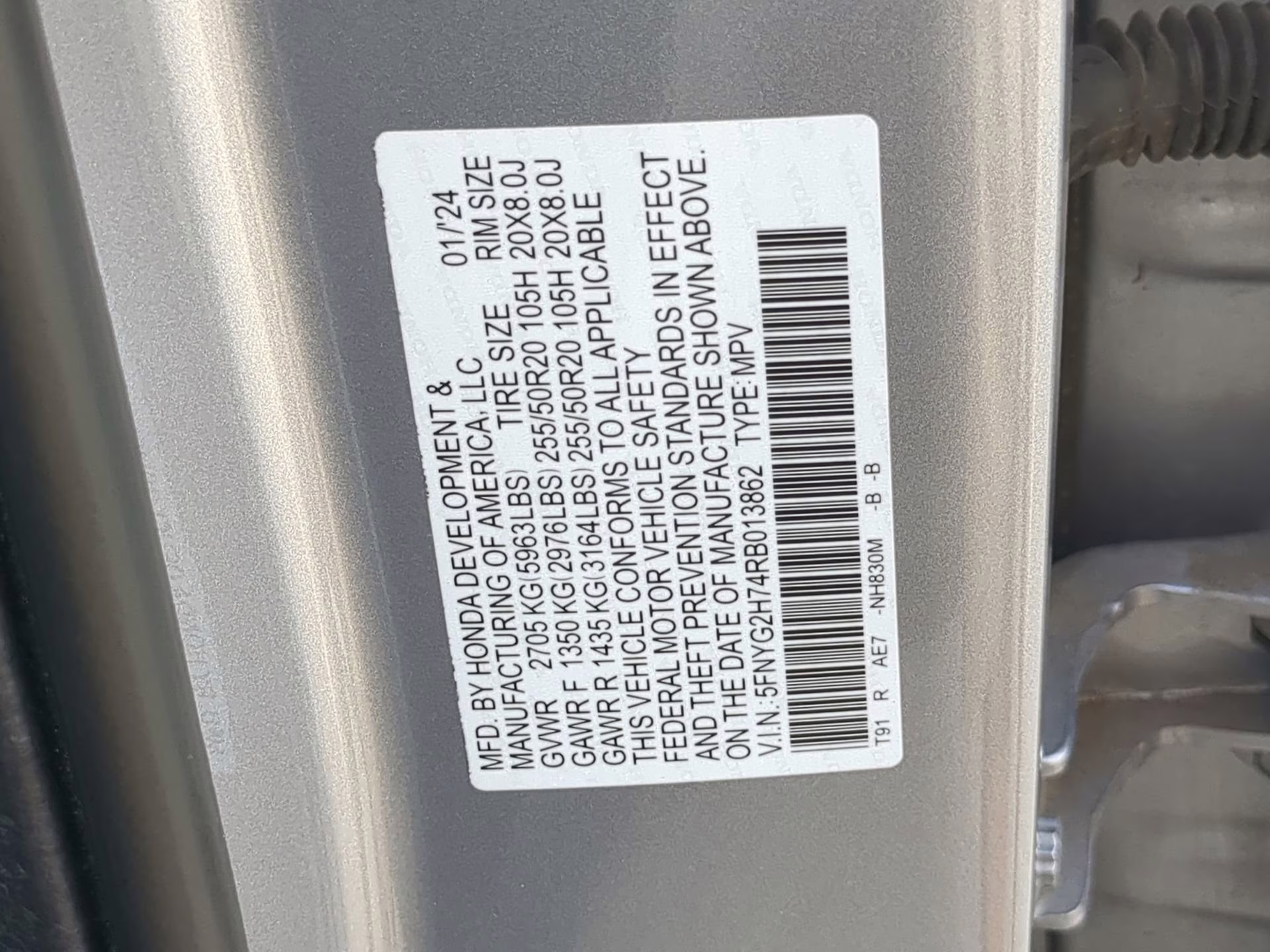 2024 Lunar Silver Metallic Honda Pilot Touring FWD SUV