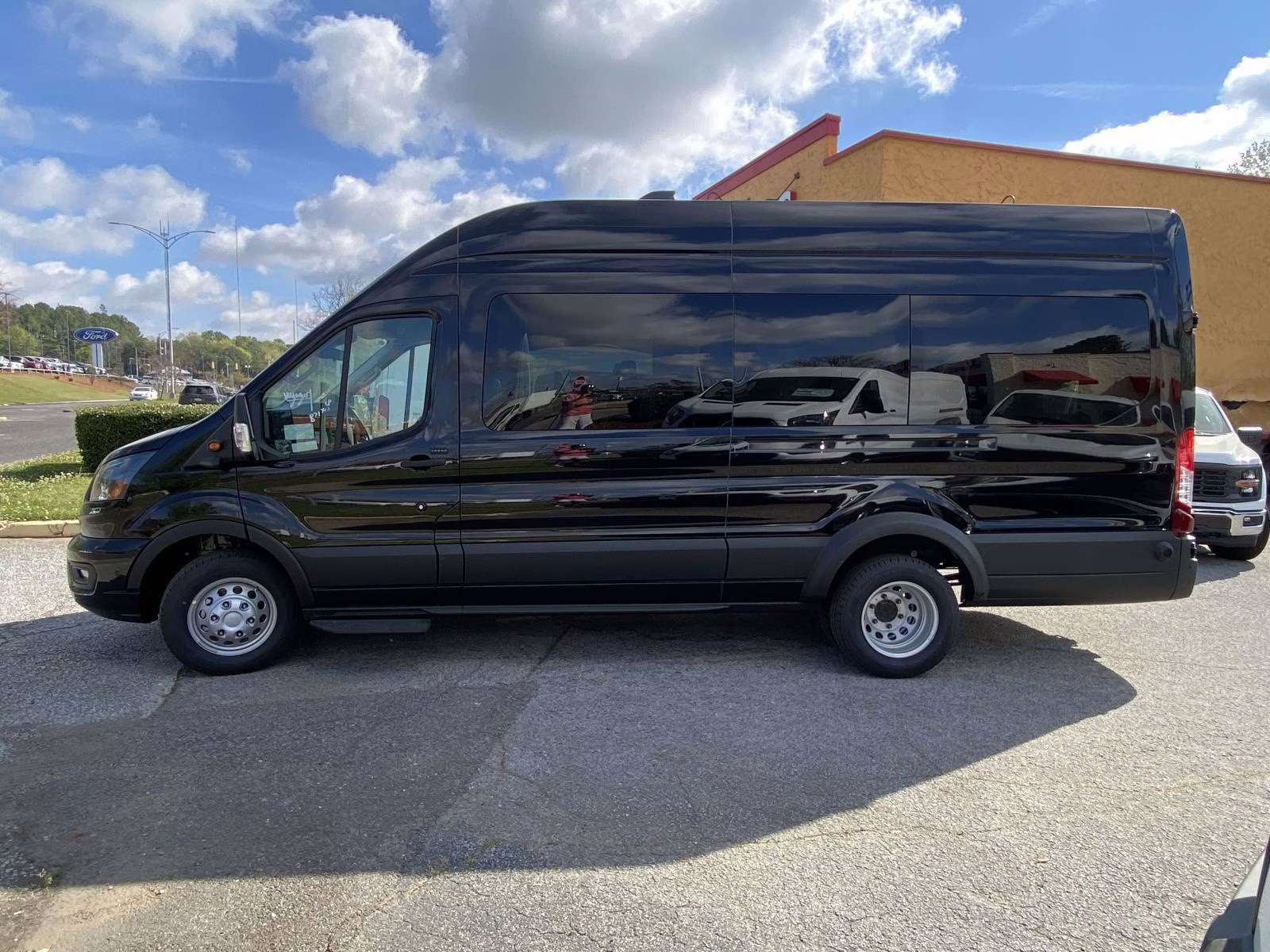 2026 Agate Black Metallic Ford Transit-350 XLT RWD Crossover