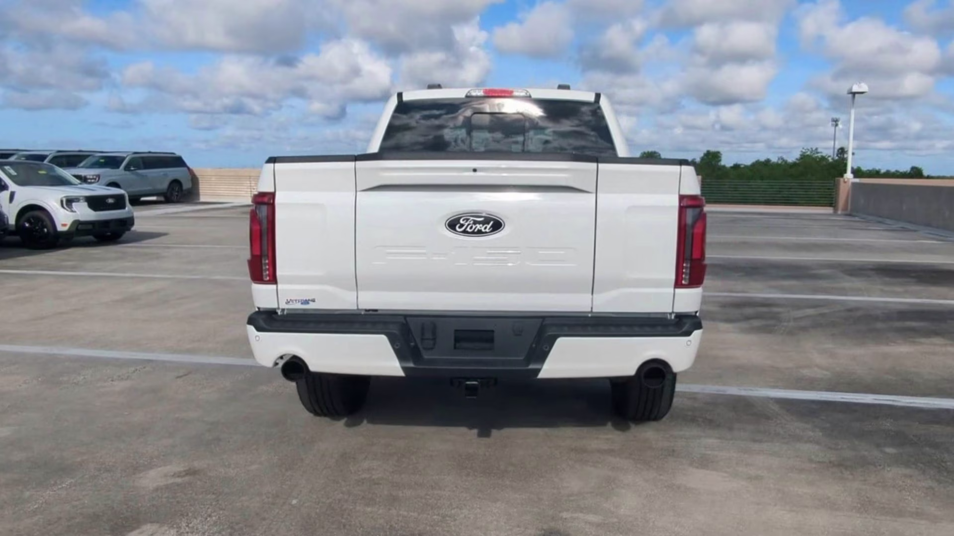 2026 Star White Metallic Tri-Coat Ford F-150 LARIAT Crew Cab Pickup 4X4 Truck