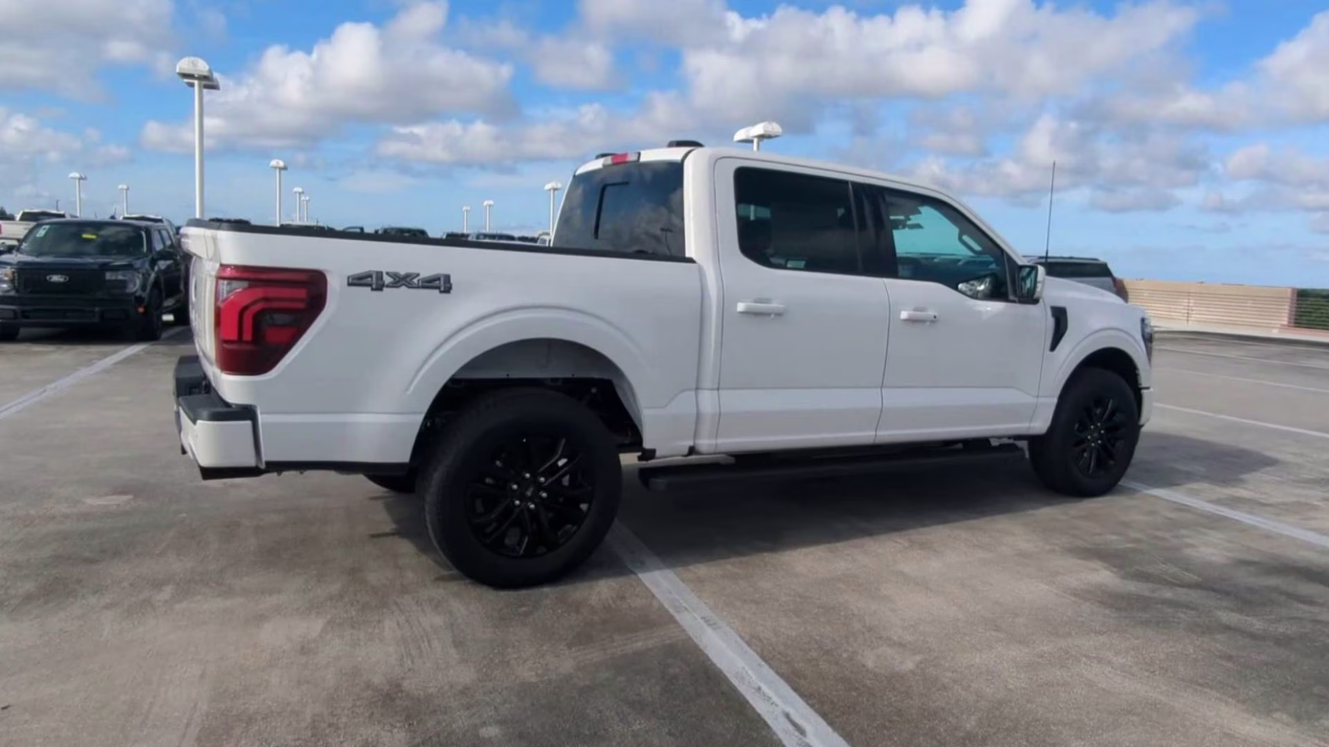 2026 Star White Metallic Tri-Coat Ford F-150 LARIAT Crew Cab Pickup 4X4 Truck