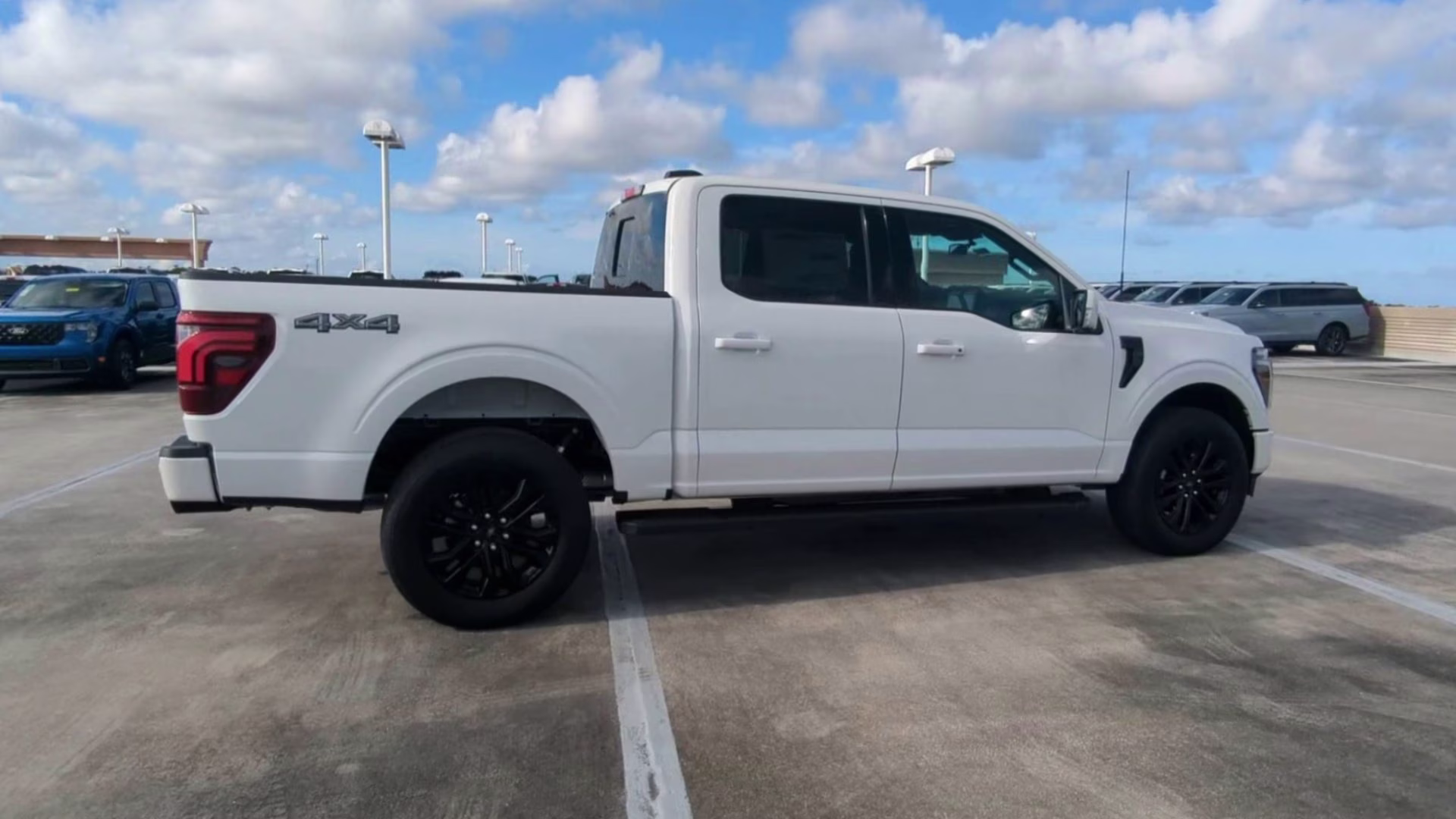 2026 Star White Metallic Tri-Coat Ford F-150 LARIAT Crew Cab Pickup 4X4 Truck